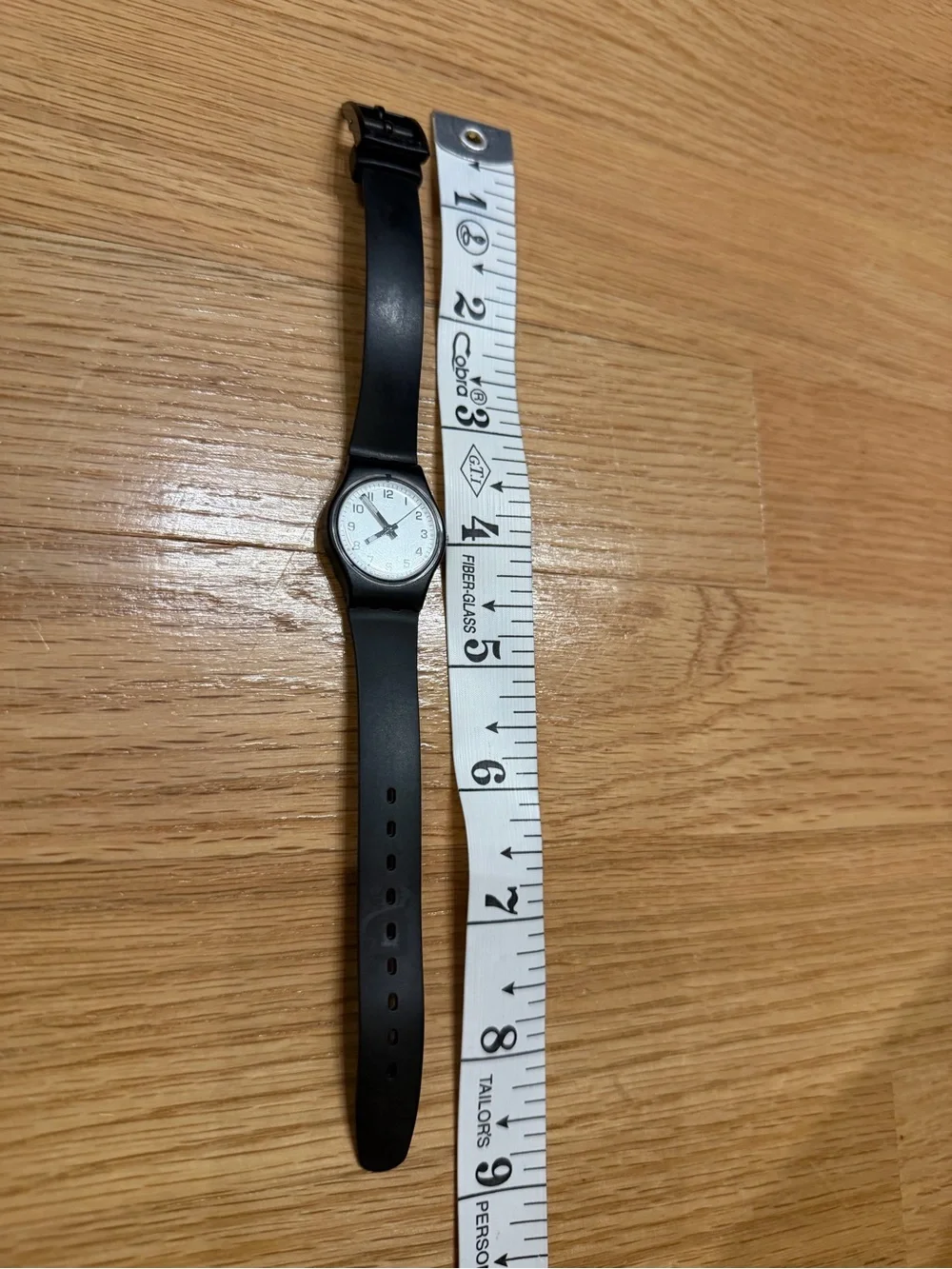 Swatch Something New Black and White Minimalist Analog Watch water resistant